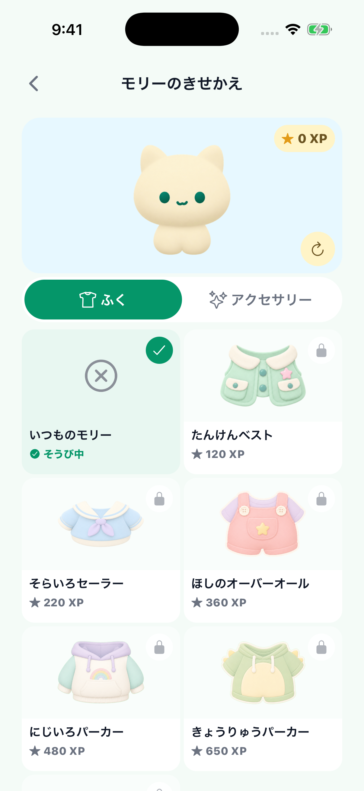 モリーのきせかえ。モリーのプレビューと服の一覧が並ぶアプリ画面